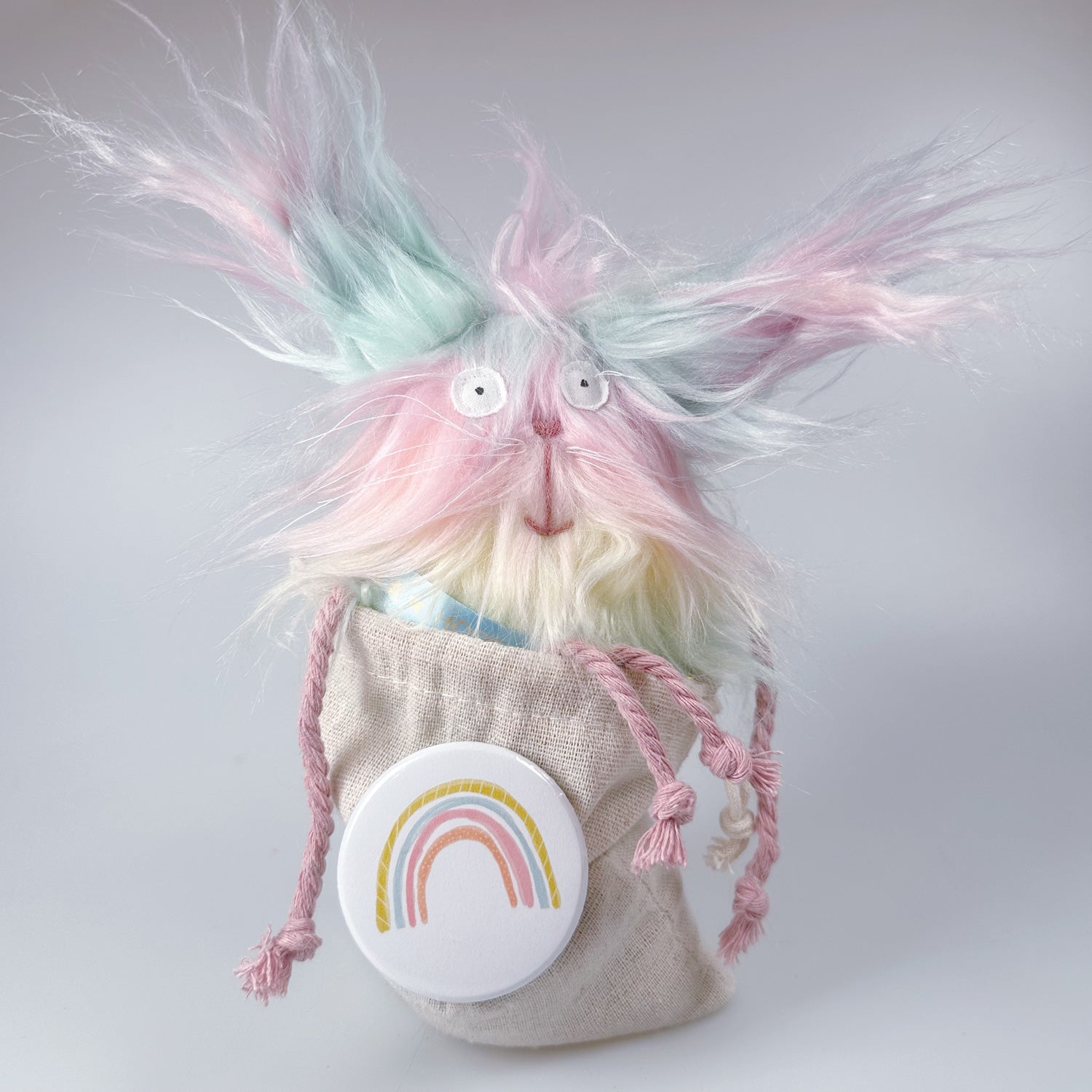 Kuscheltier Schutzengel- Regenbogenkatze im Sack „Hope“