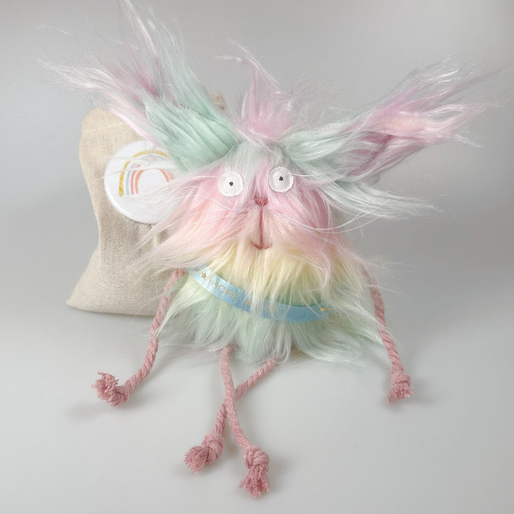 Kuscheltier Schutzengel- Regenbogenkatze im Sack „Hope“
