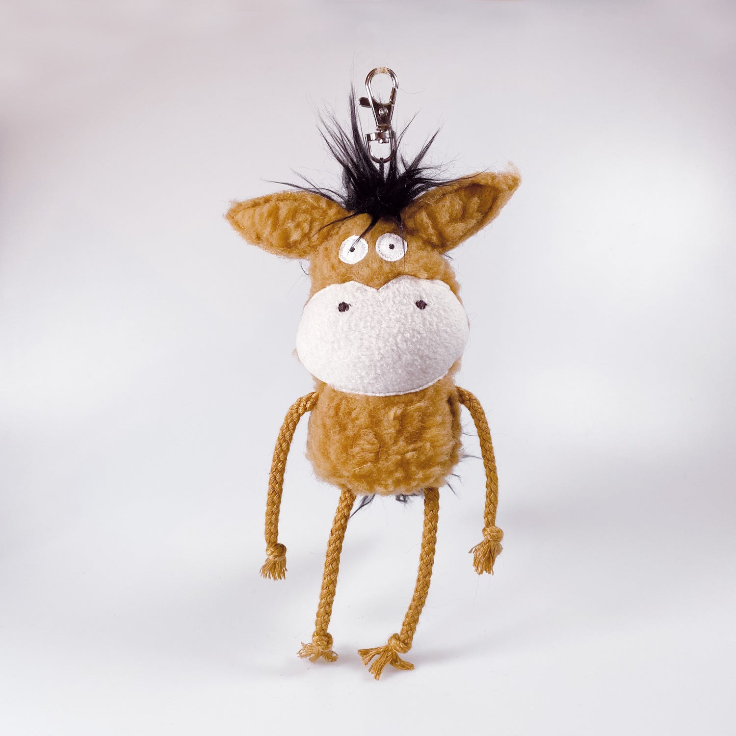 Soft toy pony in a bag “Luca”