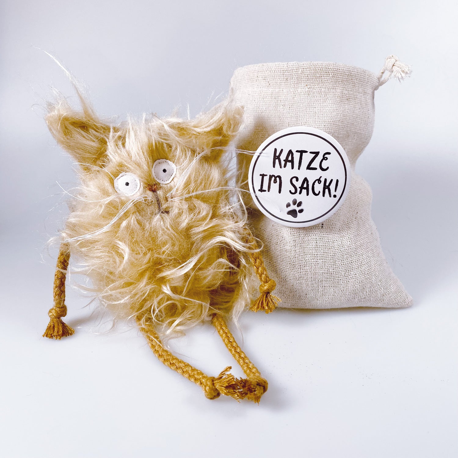 Cuddly toy cat in a bag “Curry”