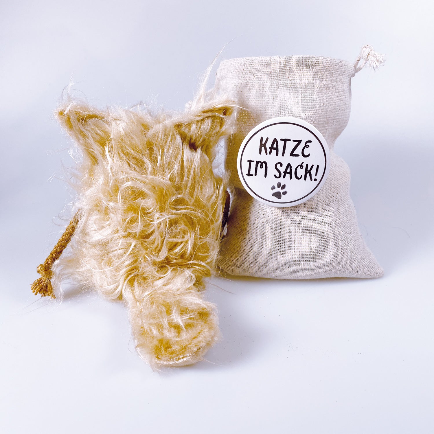 Cuddly toy cat in a bag “Curry”