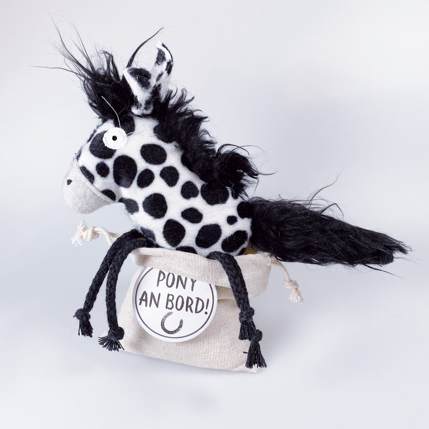 Soft toy pony in a bag “Dots”