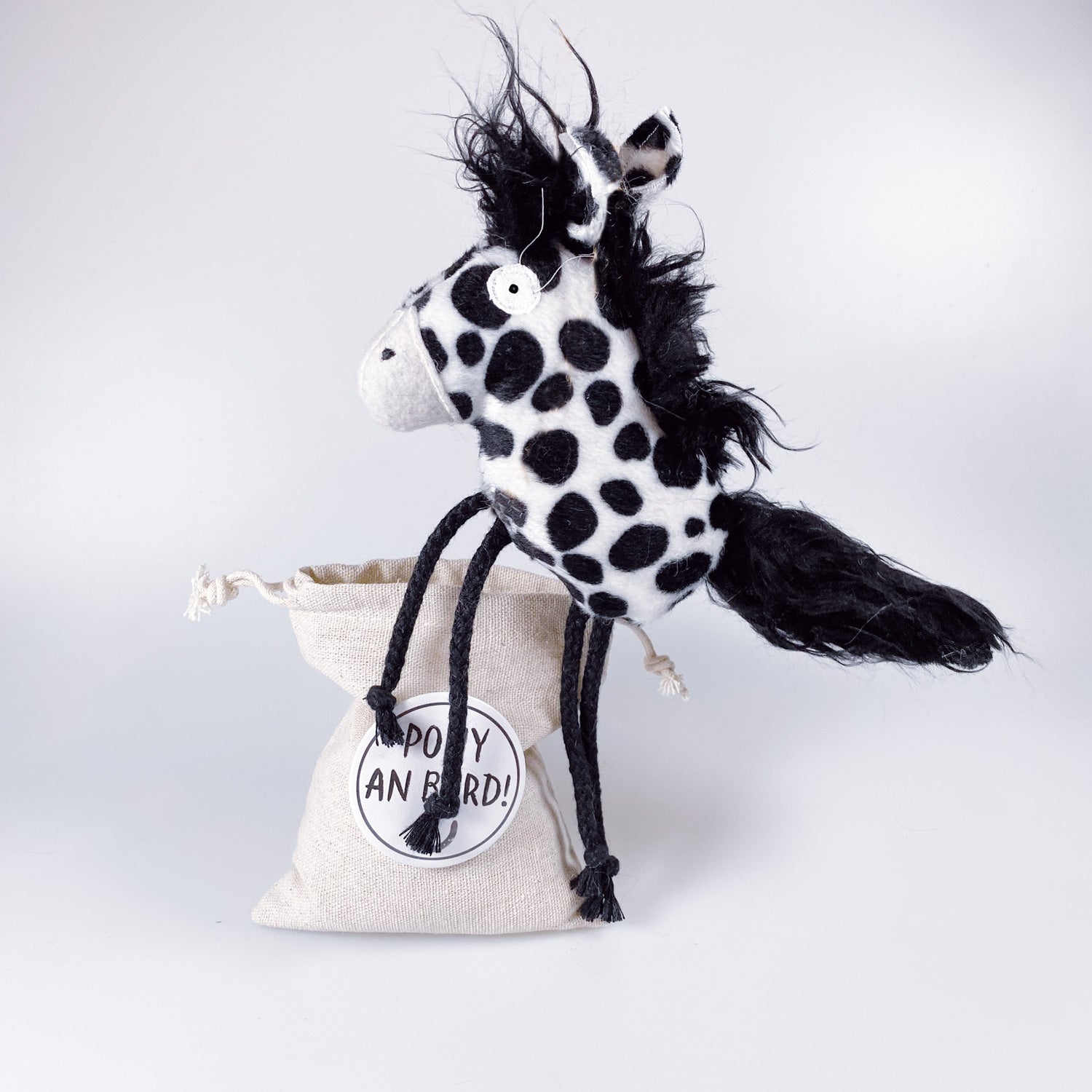 Soft toy pony in a bag “Dots”