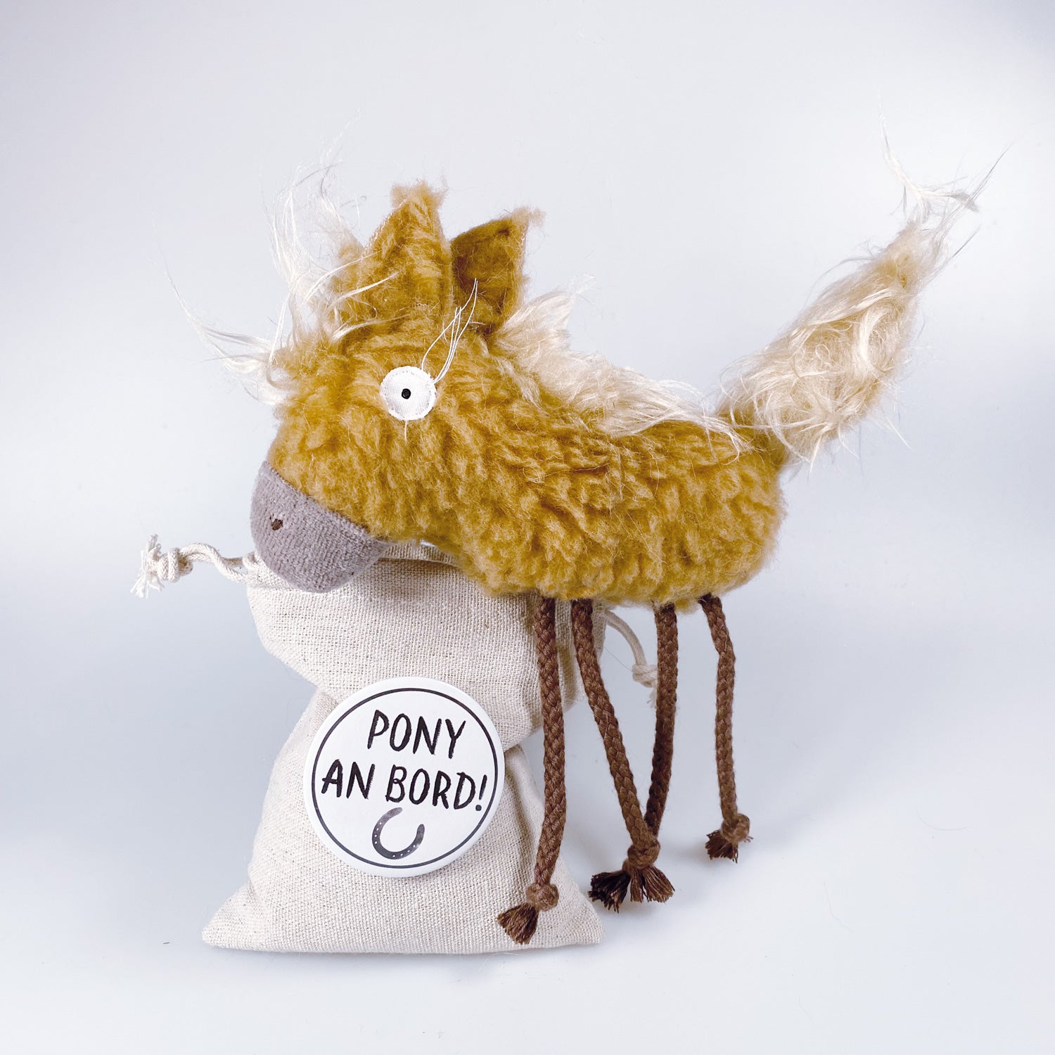 Soft toy pony in a bag “Levi”