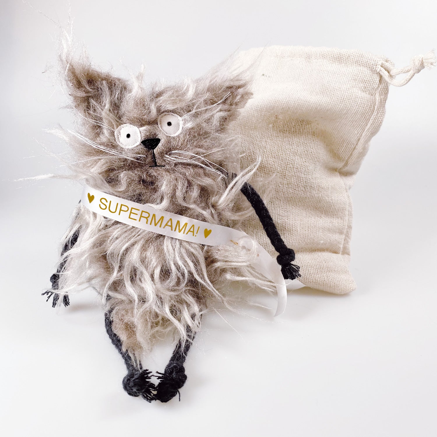 Cuddly toy cat in a sack “Lou”