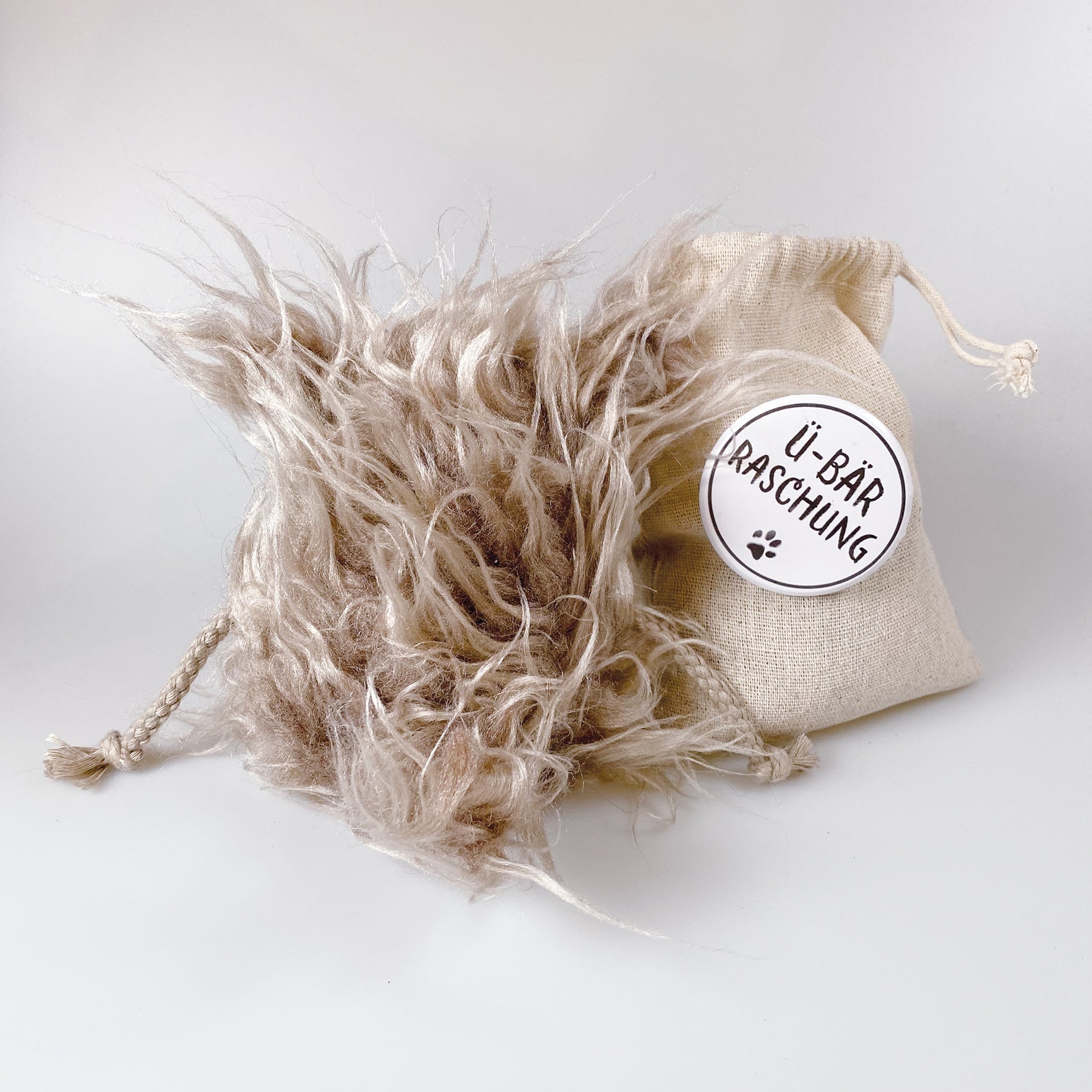 Kuscheltier Bär im Sack „Per“