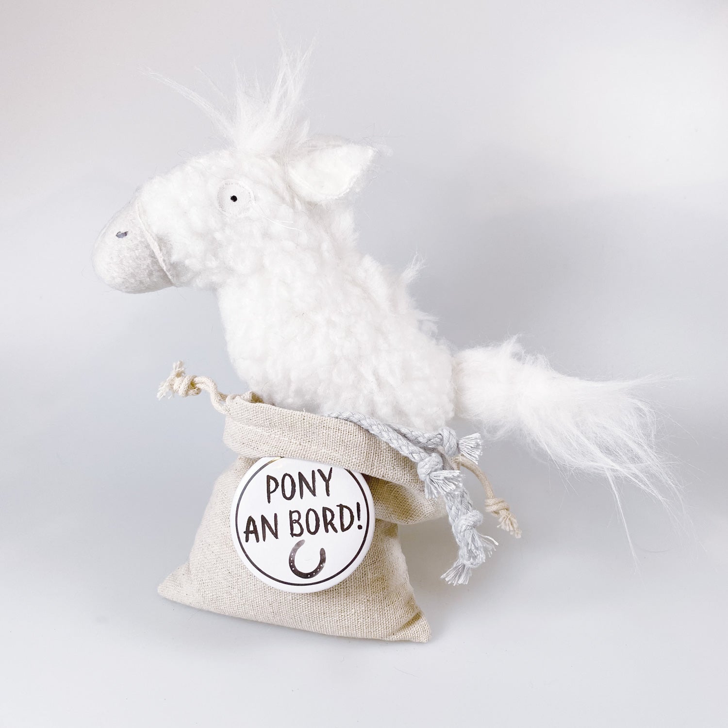 Cuddly toy pony in a bag “Vida”