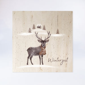 Holzpostkarte “Winterhirsch mit Haus“