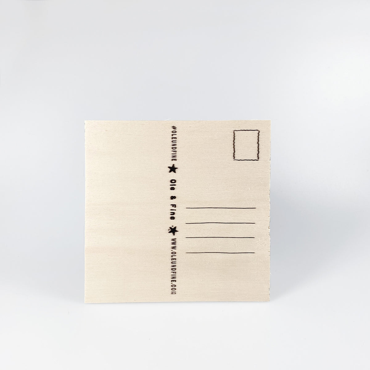 Individual wooden postcard with design 